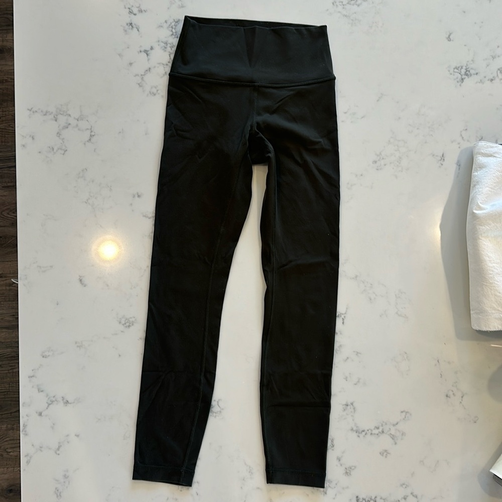 Lululemon leggings size 4. Olive color in good condition